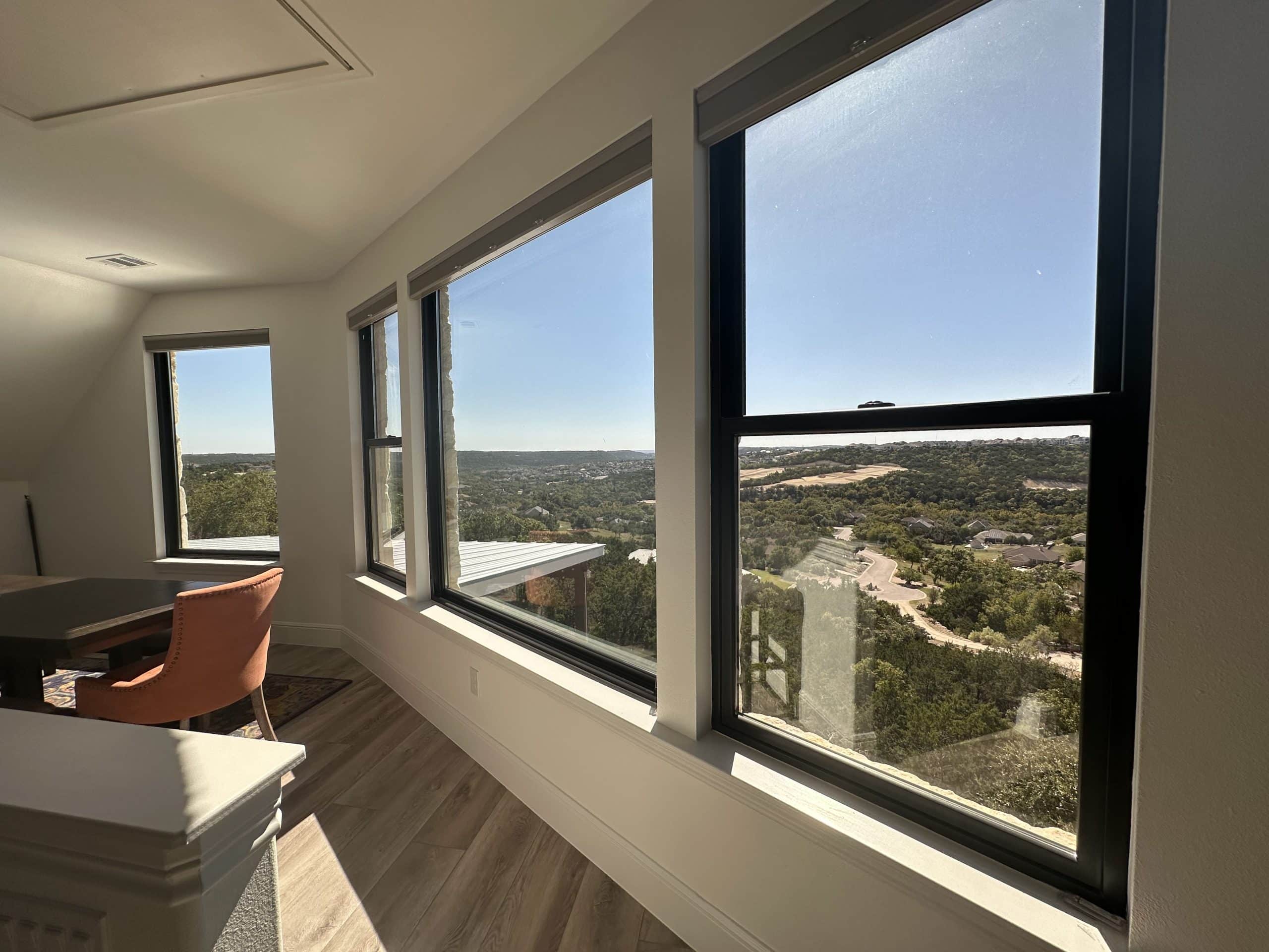 Large windows in upper story of Austin Texas home