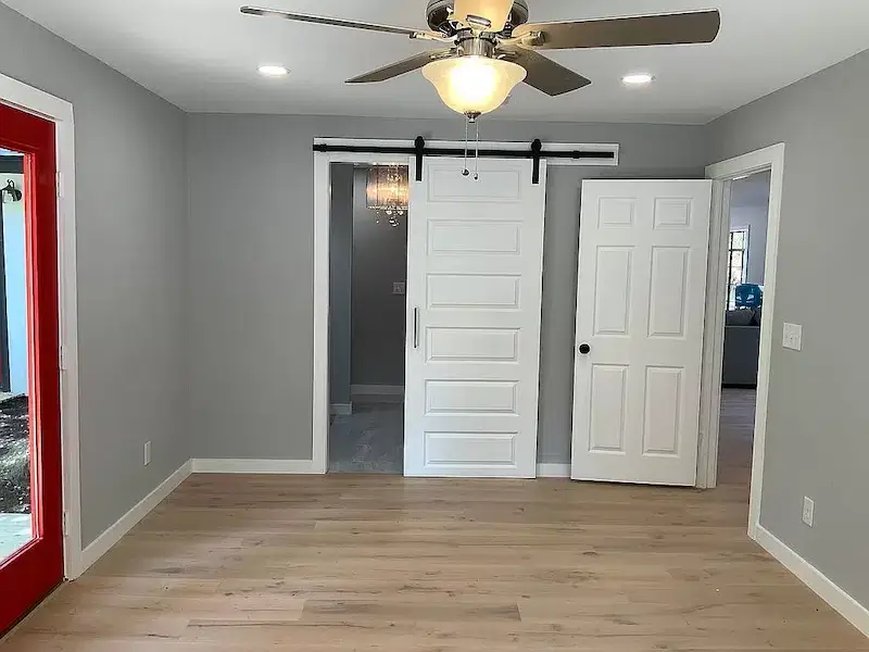 Appaloosa Way Custom Home featuring gray walls and wood flooring in Austin, TX