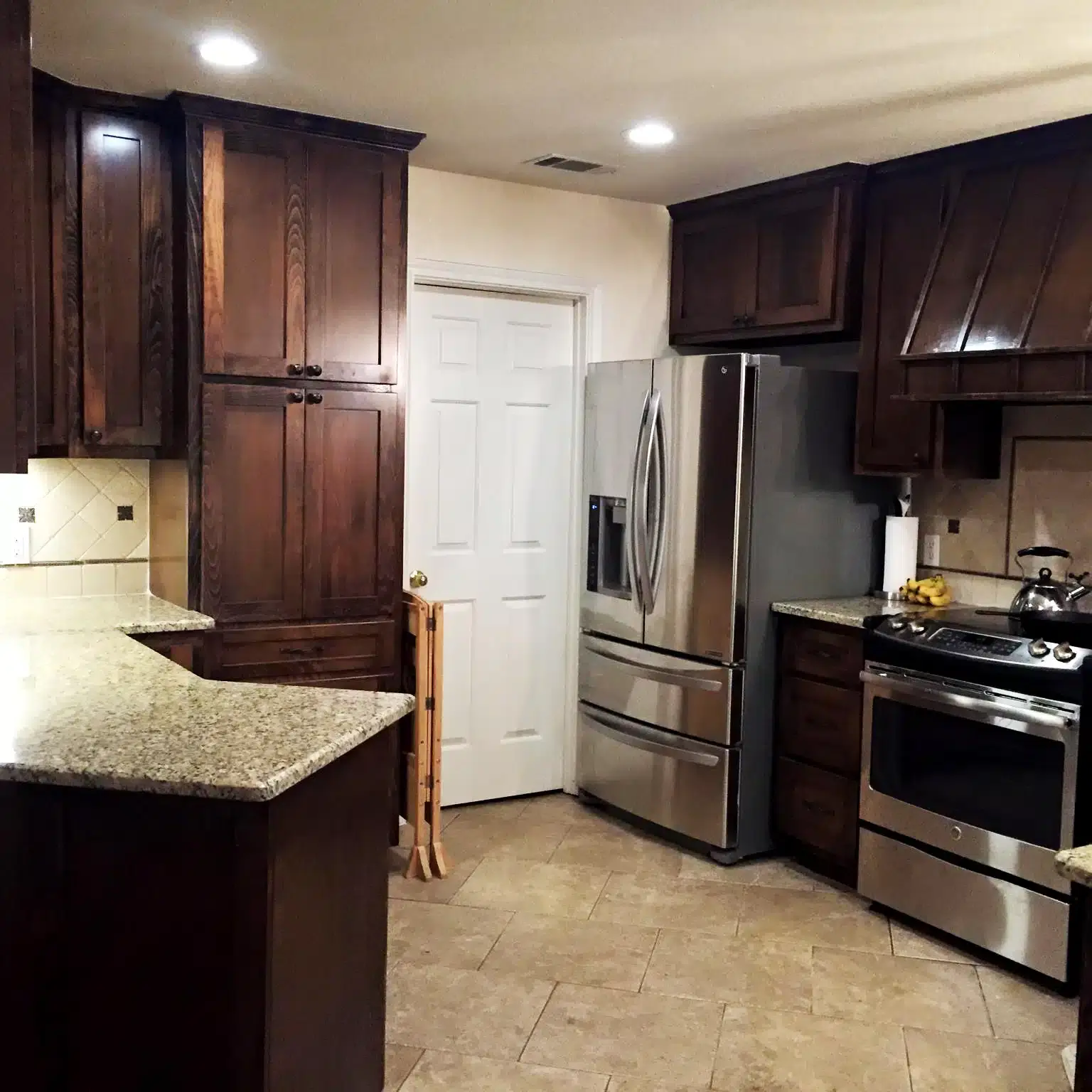 Marble and Oak kitchen in Taylor, Texas home
