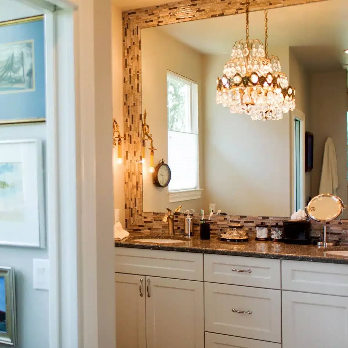 McIntyre Whole Home Remodel showcasing chic vanity and decorative mirror in Austin, TX
